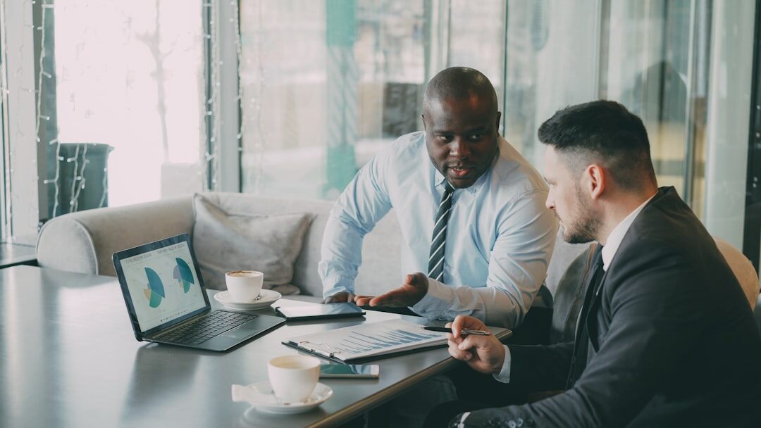 business consultants meeting with client