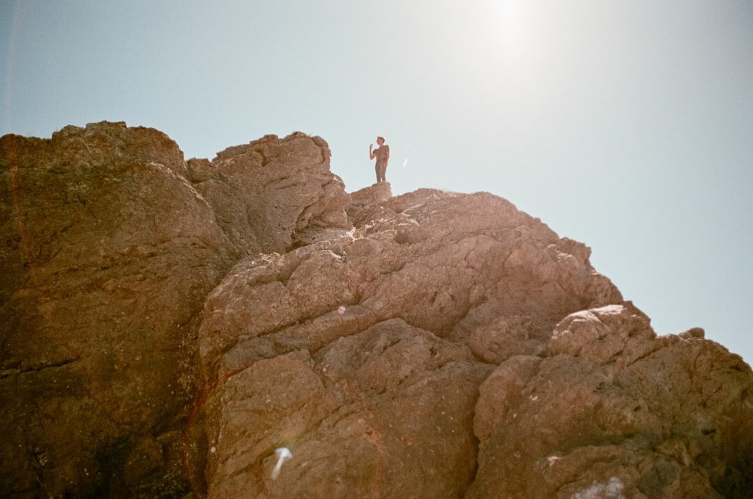 inspirational business leader on mountain top