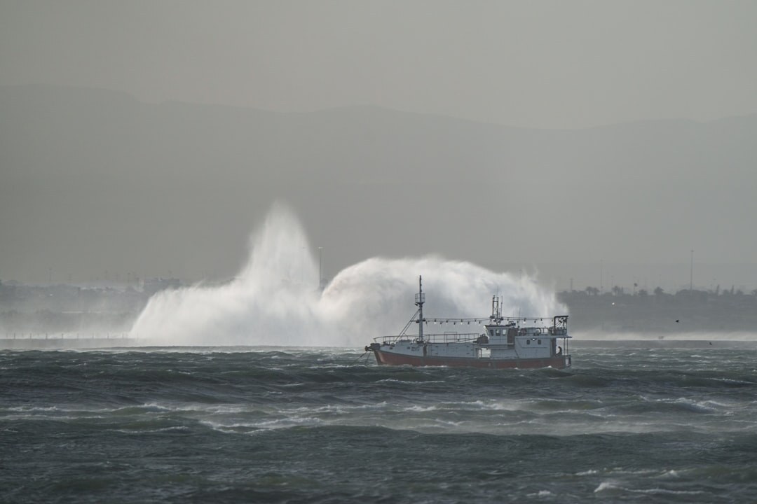 ship captain steering through storm