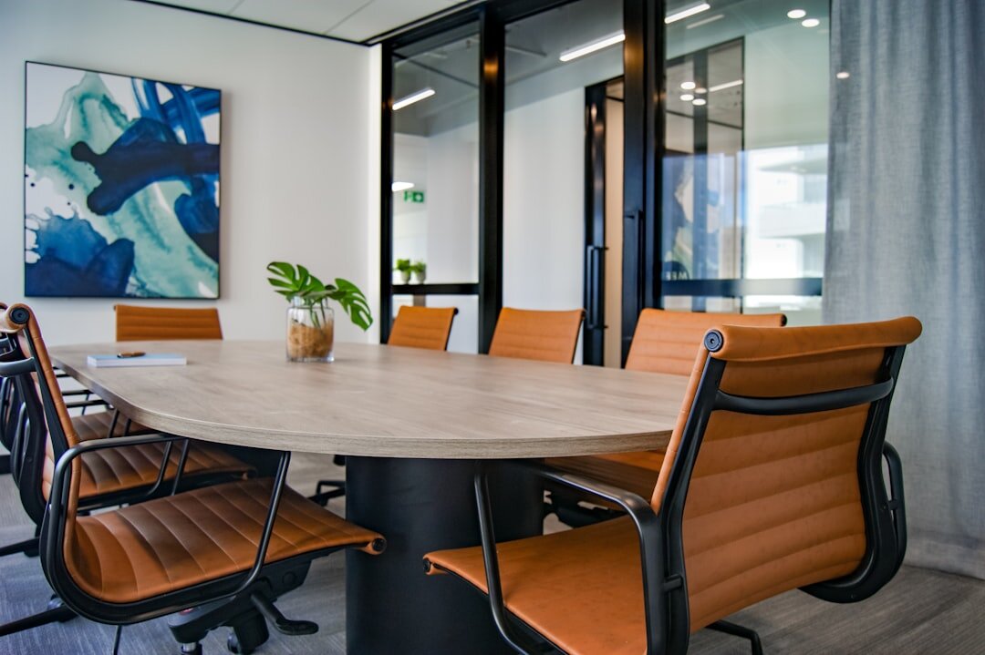 modern boardroom with digital screens and collaborative tools