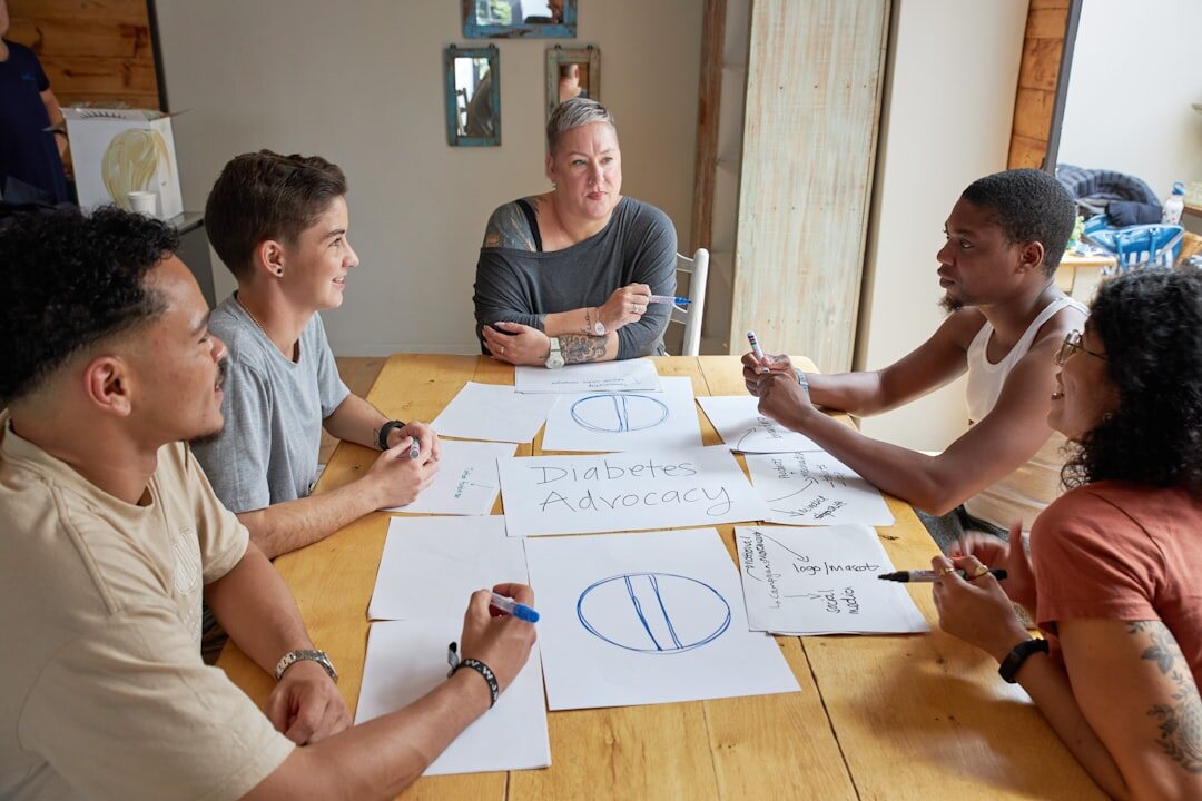 diverse board members discussing charts and graphs